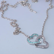Load image into Gallery viewer, Gold Plated Double Heart Pendant with Turquoise Swarovski Crystals