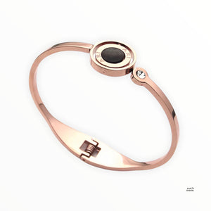 Stainless Steel Yellow/ Rose Gold Plated Silver Twist Bangle Bracelet with Mother of Pearl and Onyx